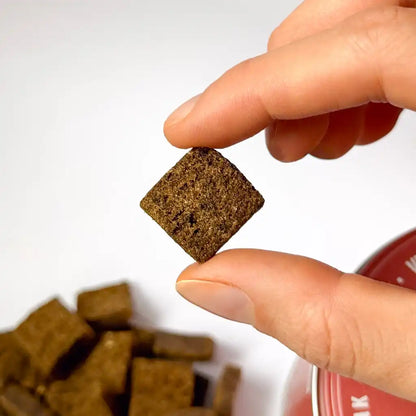 Tamaño real de los masticables Multivitamínico Gutsy en la mano